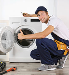 Verified MS Cooling point technician repairing an appliance in Bangalore